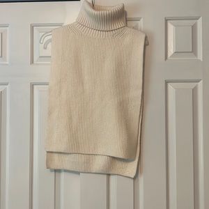 Knitted turtle neck sleeveless top